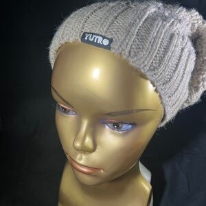 European made cable knit slouch beanie.  Wool / acrylic blend.With fleece band.
